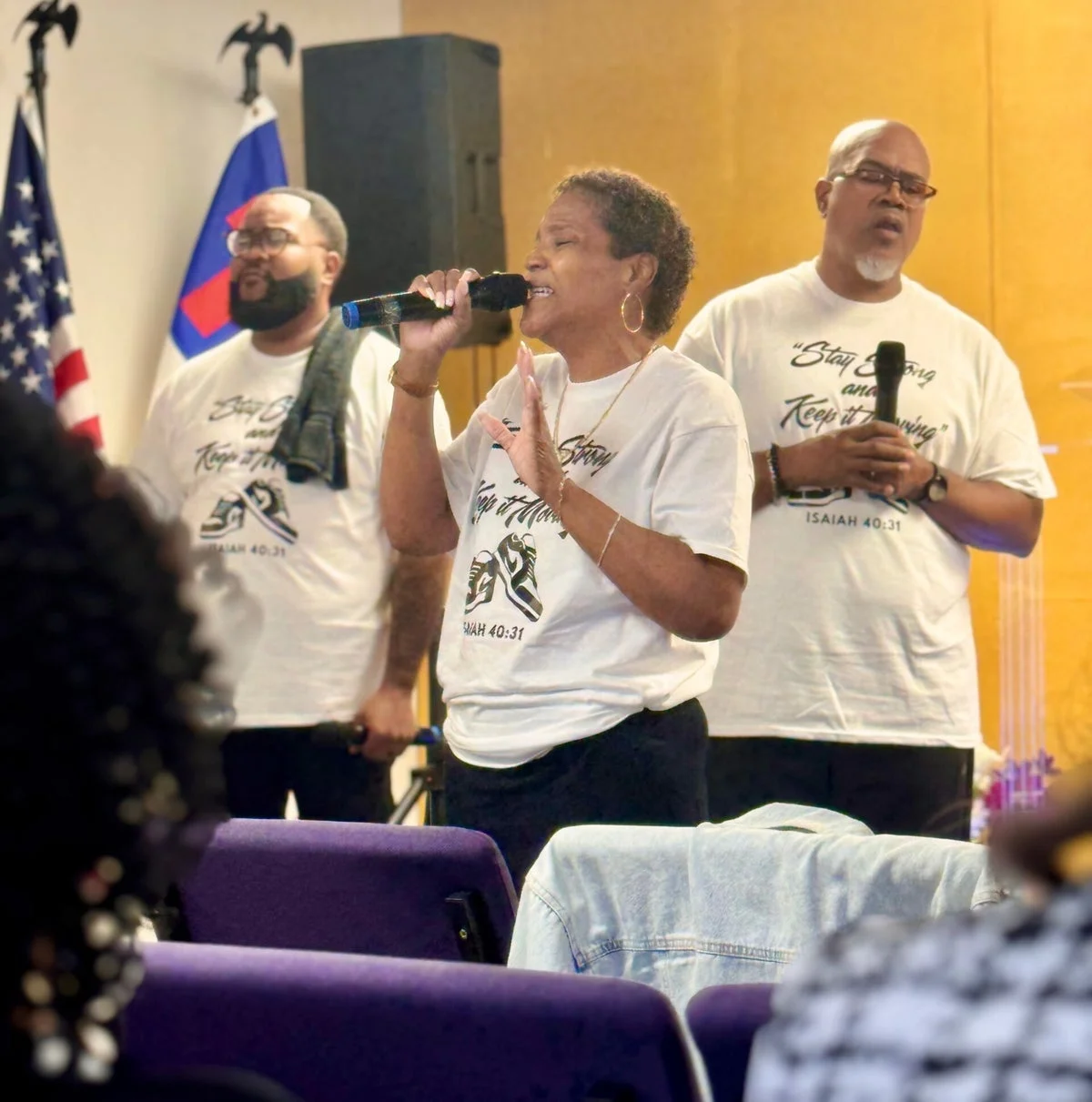 The Abundant Life worship team singing together in our Newark sanctuary